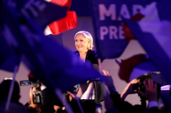 Marine Le Pen, French National Front (FN) political party leader and candidate for French 2017 presidential election, celebrates after early results in the first round of 2017 French presidential election, in Henin-Beaumont, France, April 23, 2017.    REUTERS/Charles Platiau     TPX IMAGES OF THE DAY - RTS13L2C