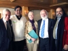 Michael Laitman posing with members of World Wisdom Council